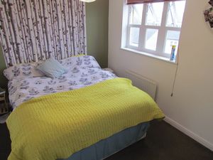 Bedroom One- click for photo gallery